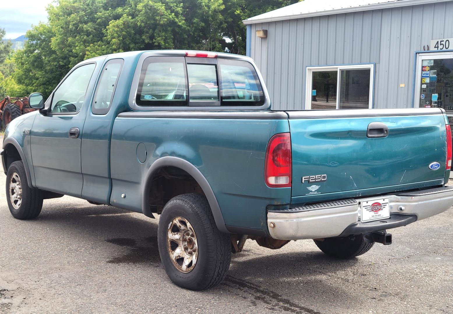 1997 Green /Tan Ford F-250 (1FTFX2866VK) with an 4.6L V8 engine, 4 Speed Manual with Overdrive transmission, located at 450 N Russell, Missoula, MT, 59801, (406) 543-6600, 46.874496, -114.017433 - 4.6L V8 Engine. 4 Speed with Overdrive Manual Transmission. 4 Wheel Drive. 3 Door. Short Box. Air Conditioning. Cruise Control. Financing is NOT Available. - Photo#7